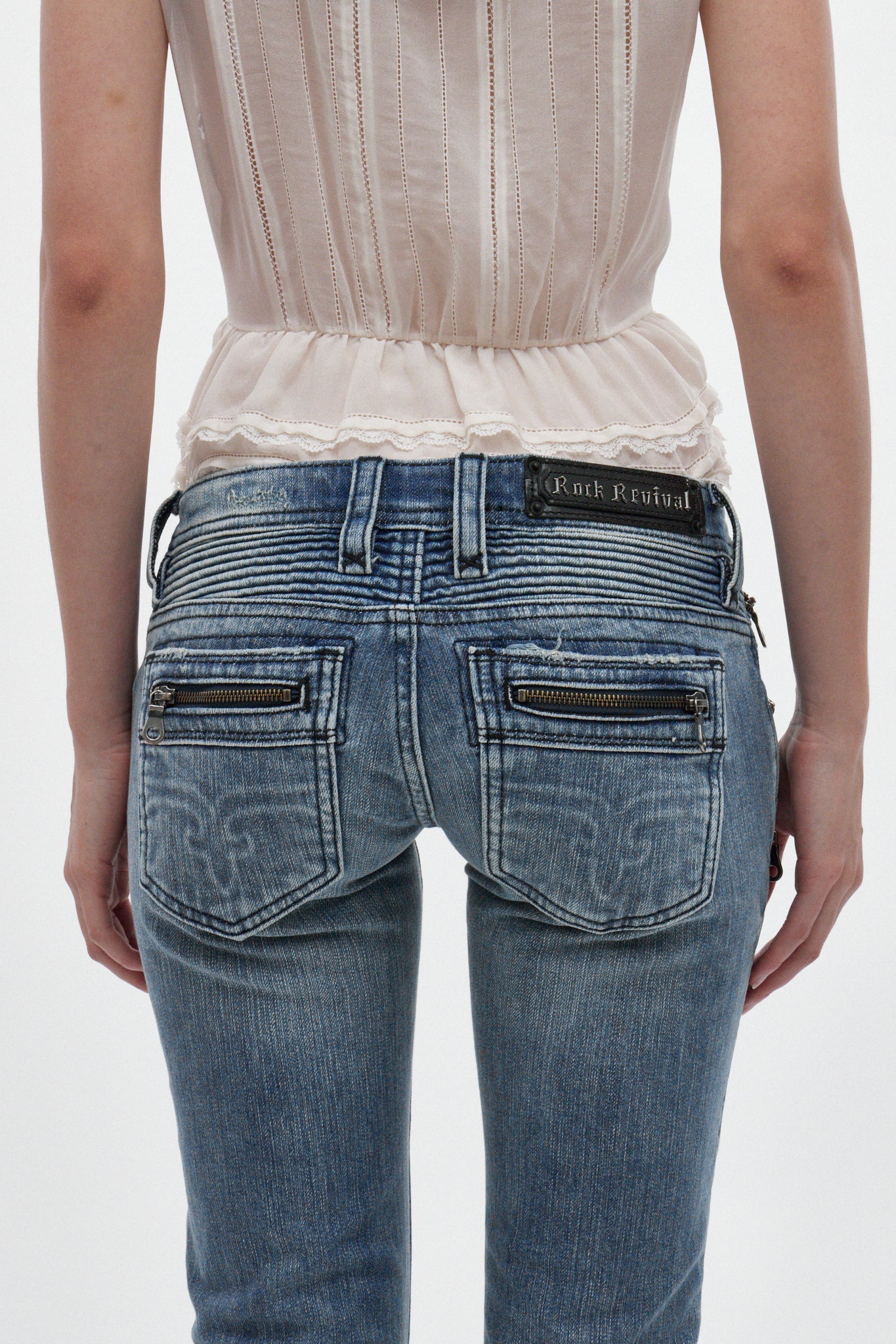 Kamil Super Low-Rise Bootcut Jeans in Medium Blue