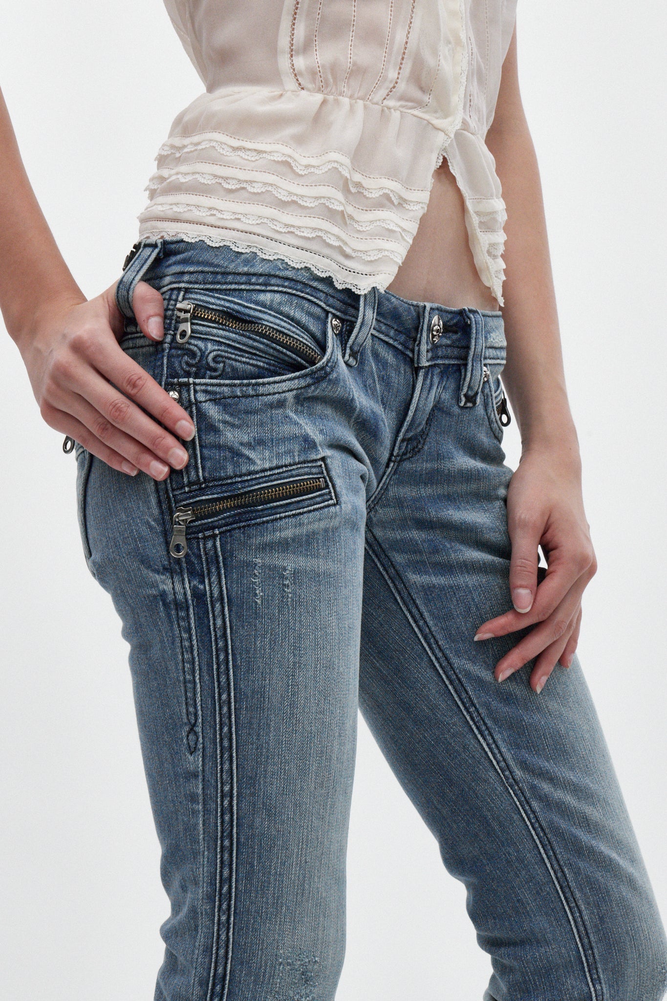 Kamil Super Low-Rise Bootcut Jeans in Medium Blue