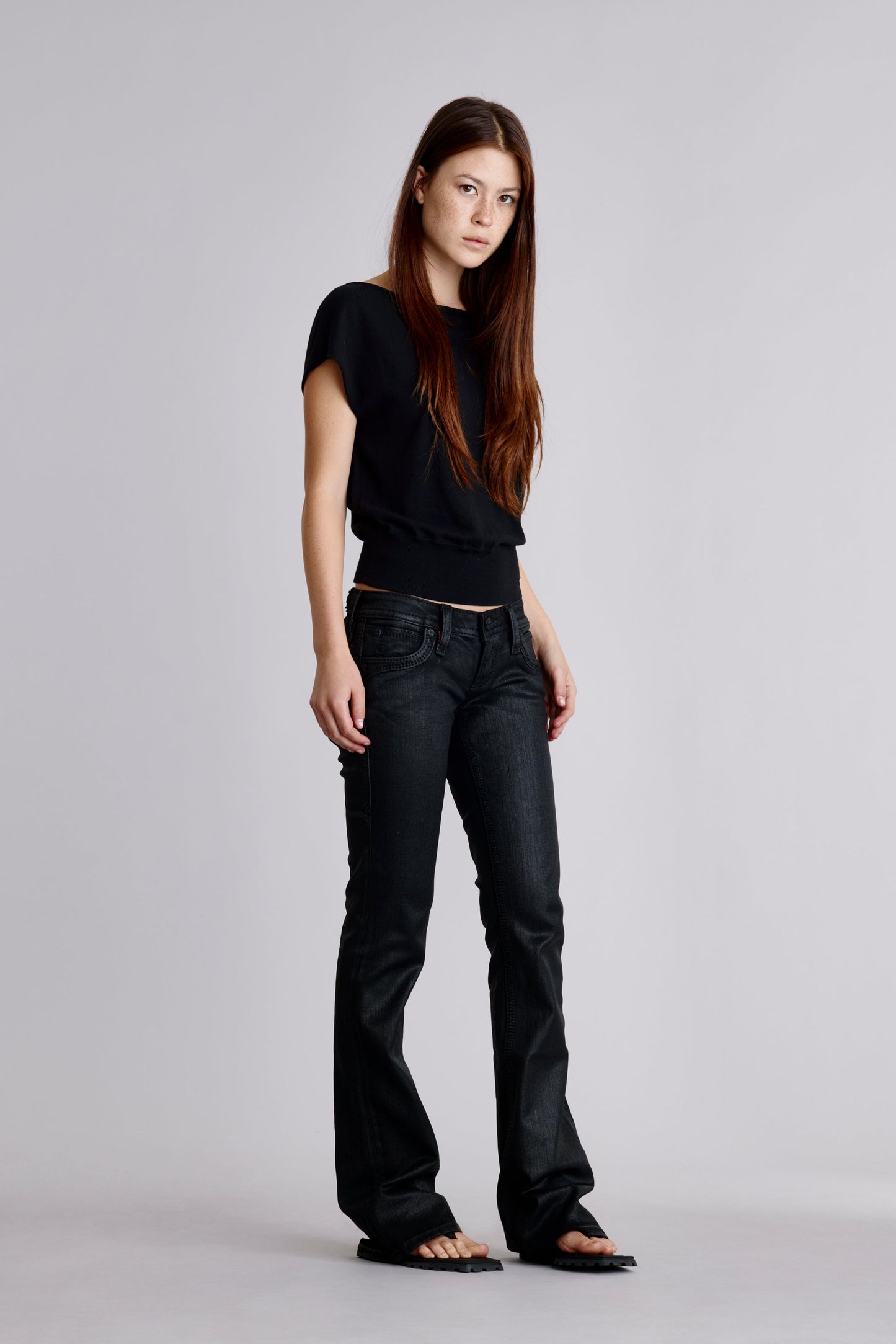 Gwen Black Super Low-Rise Bootcut Jeans in Black Coating